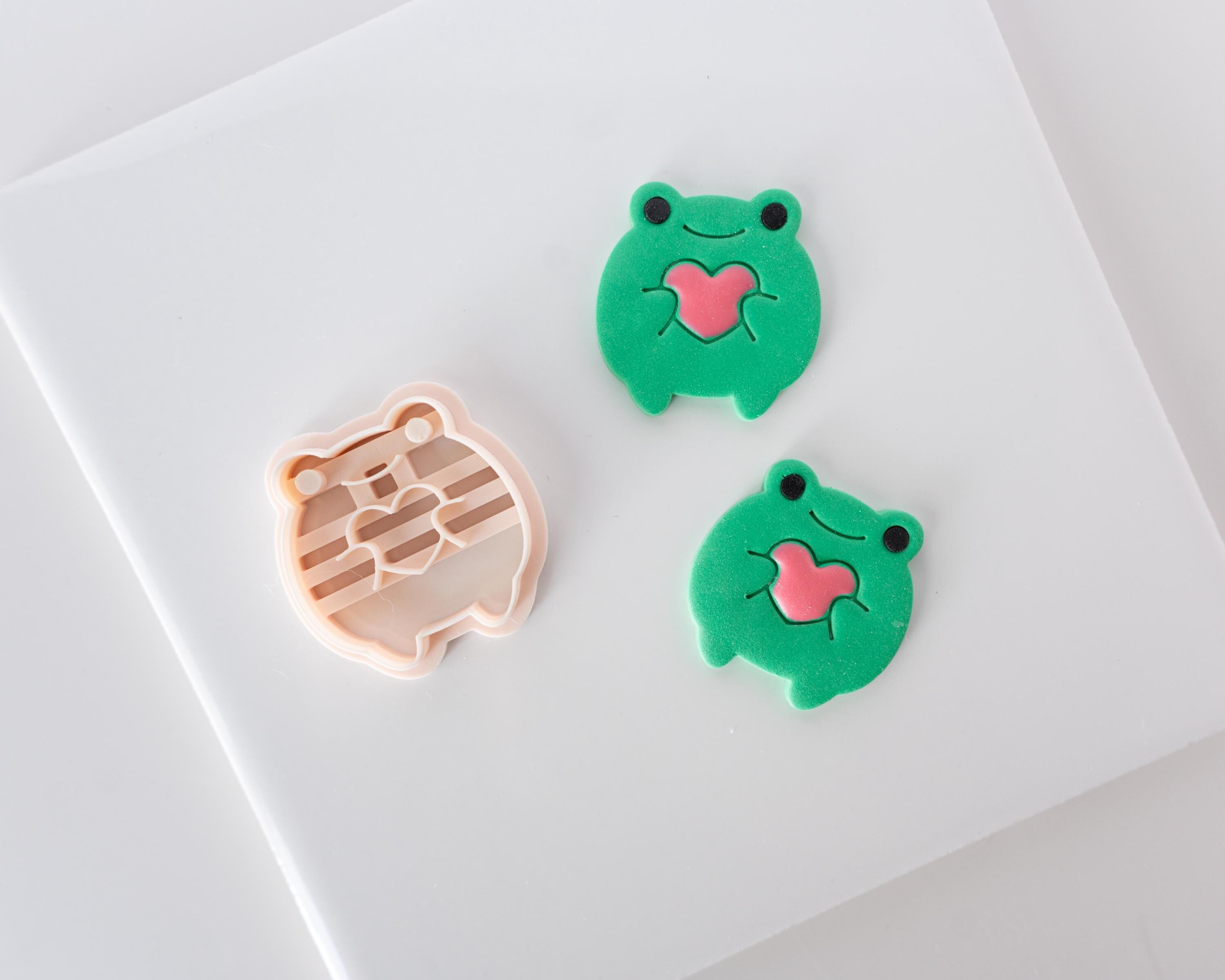 Frog holding Heart