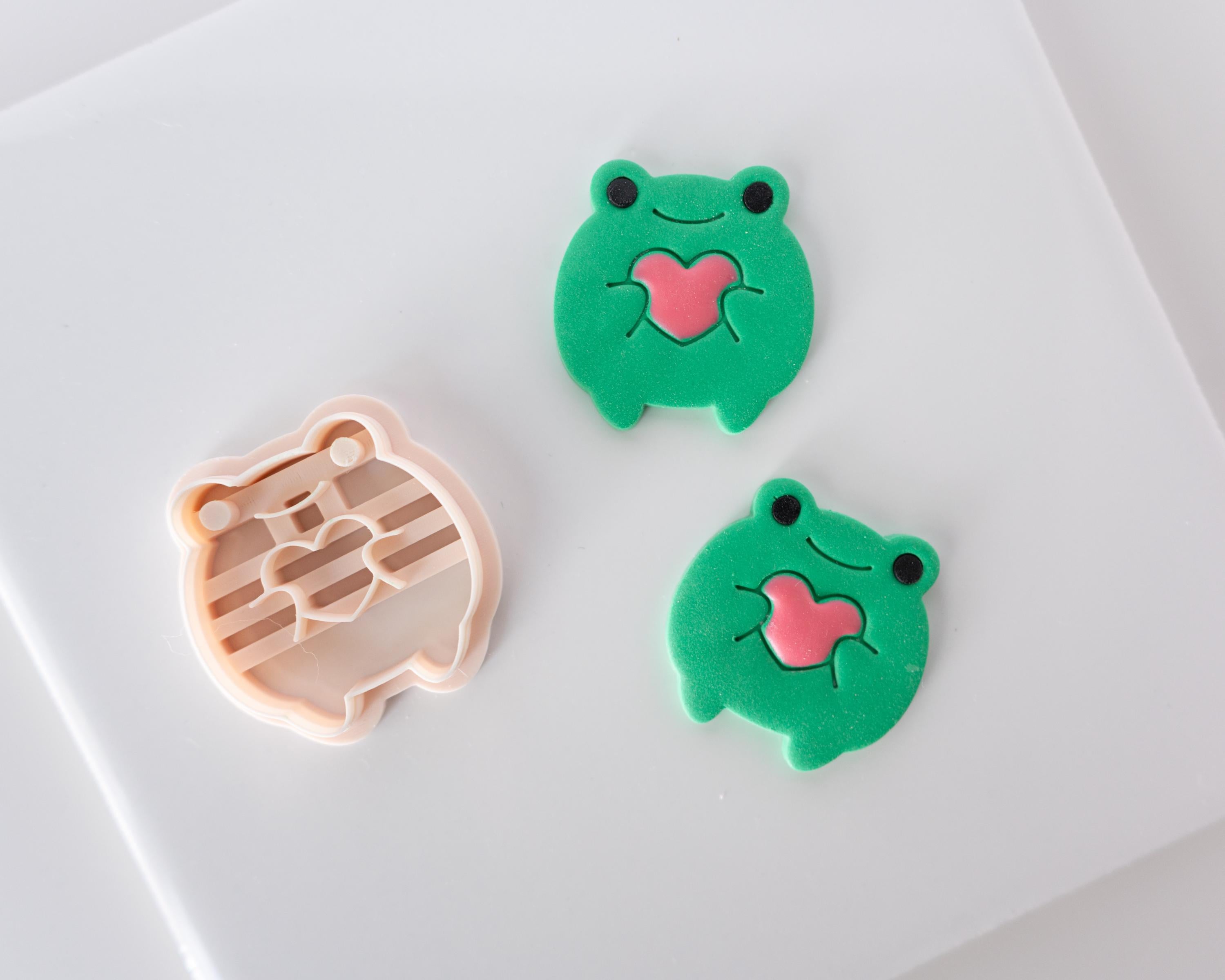Frog holding Heart