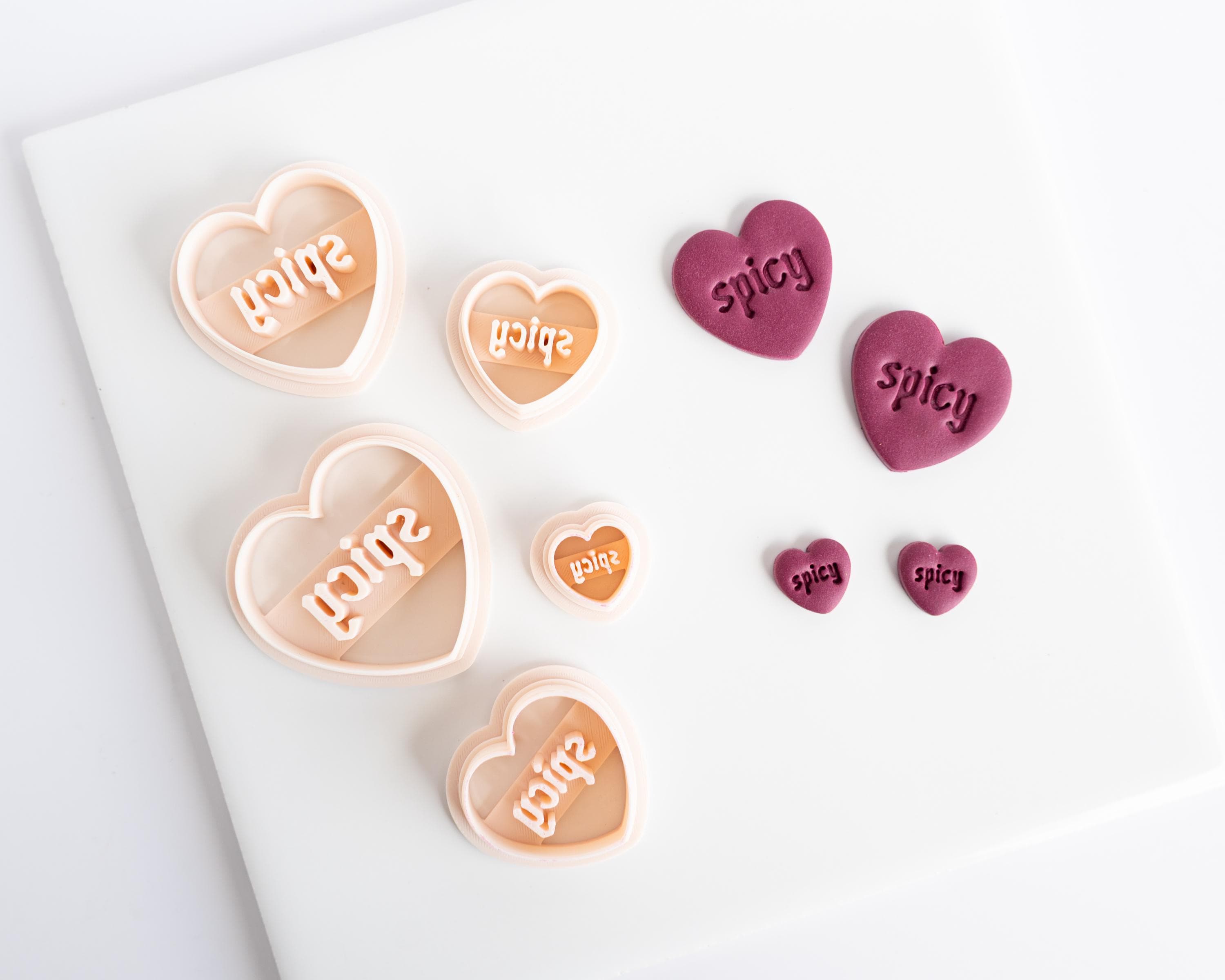 Spicy and Smut Embossed Heart