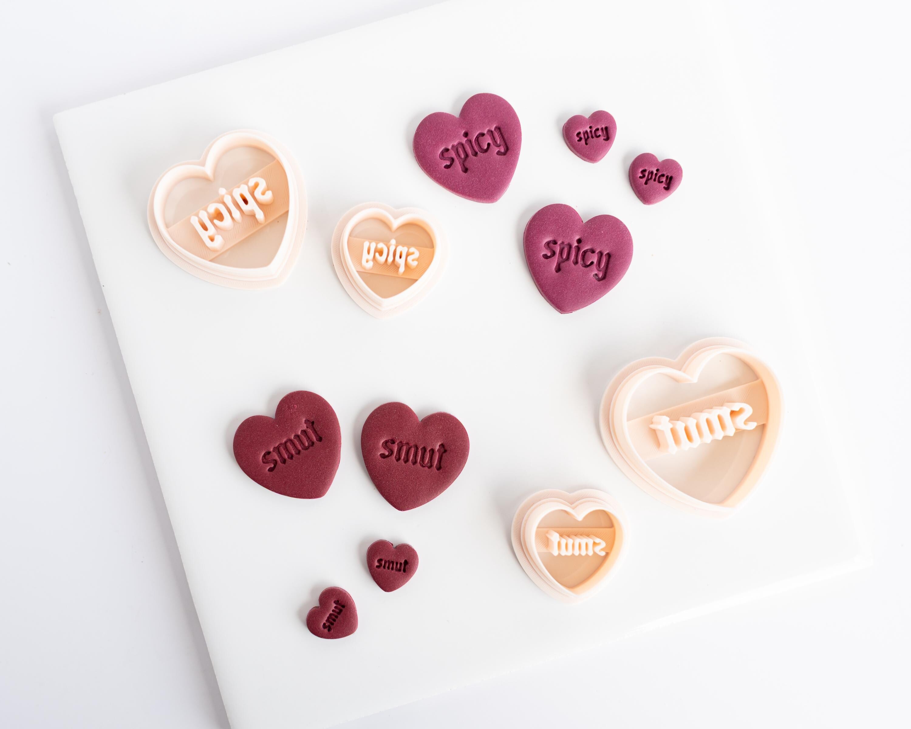 Spicy and Smut Embossed Heart