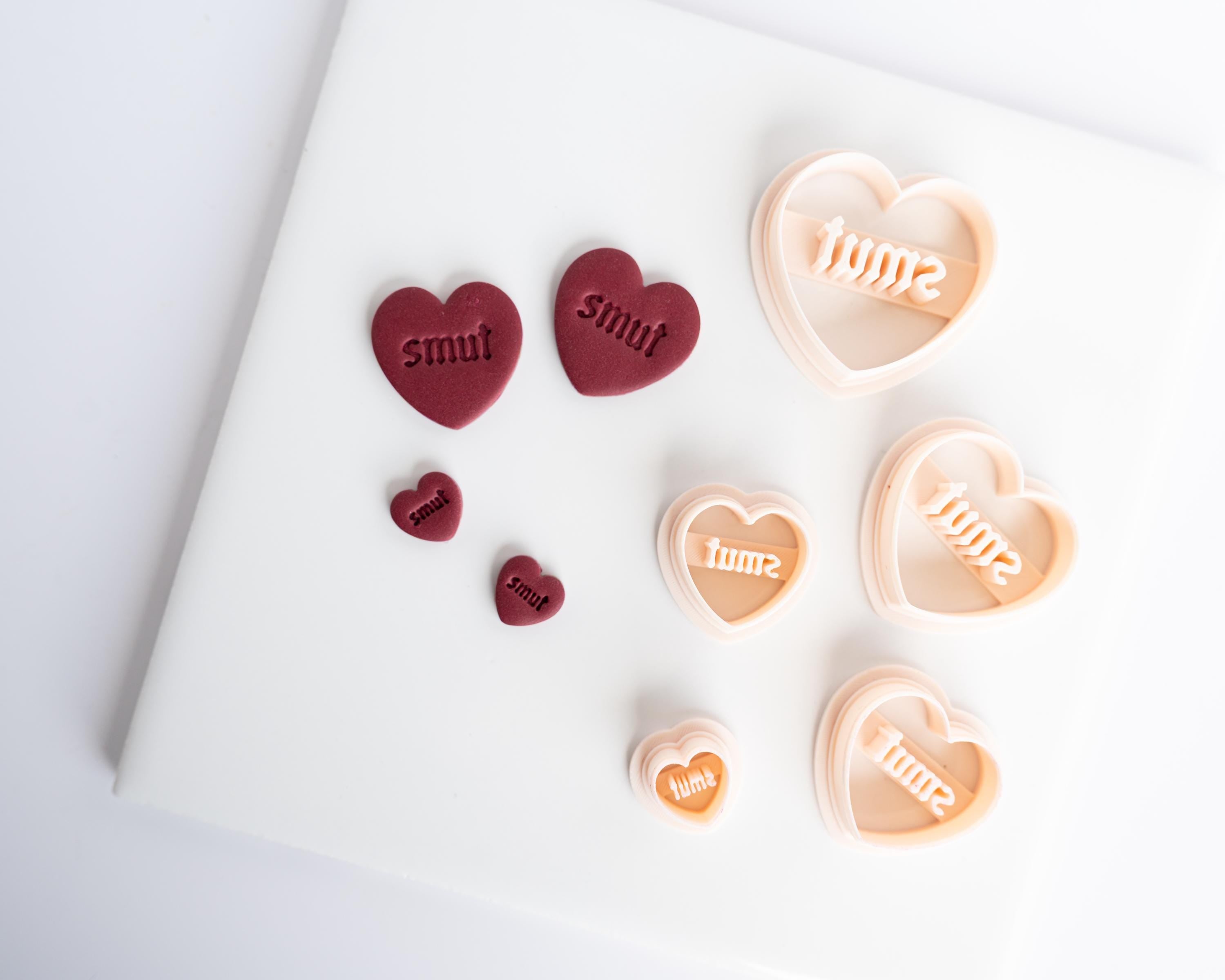 Spicy and Smut Embossed Heart