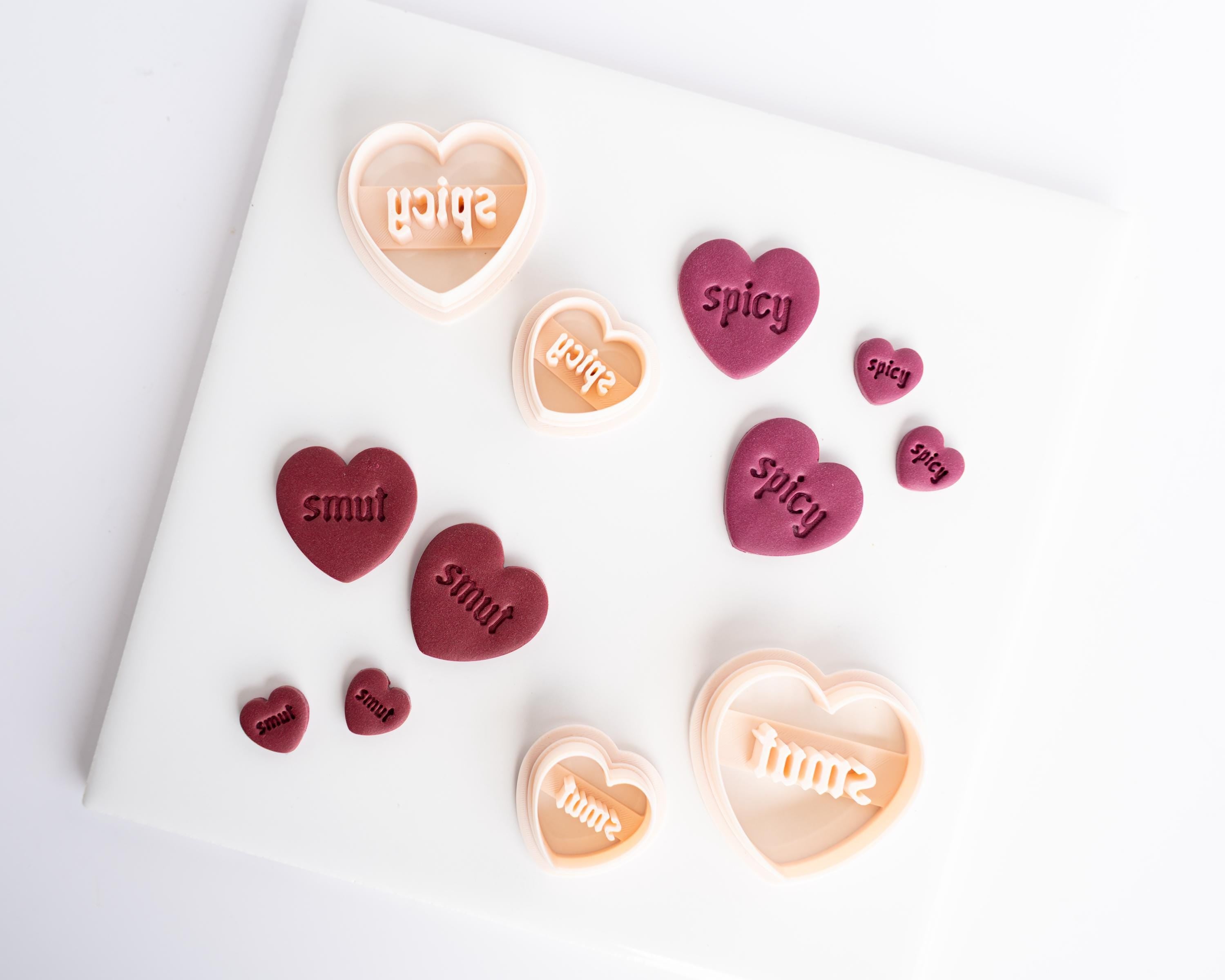 Spicy and Smut Embossed Heart