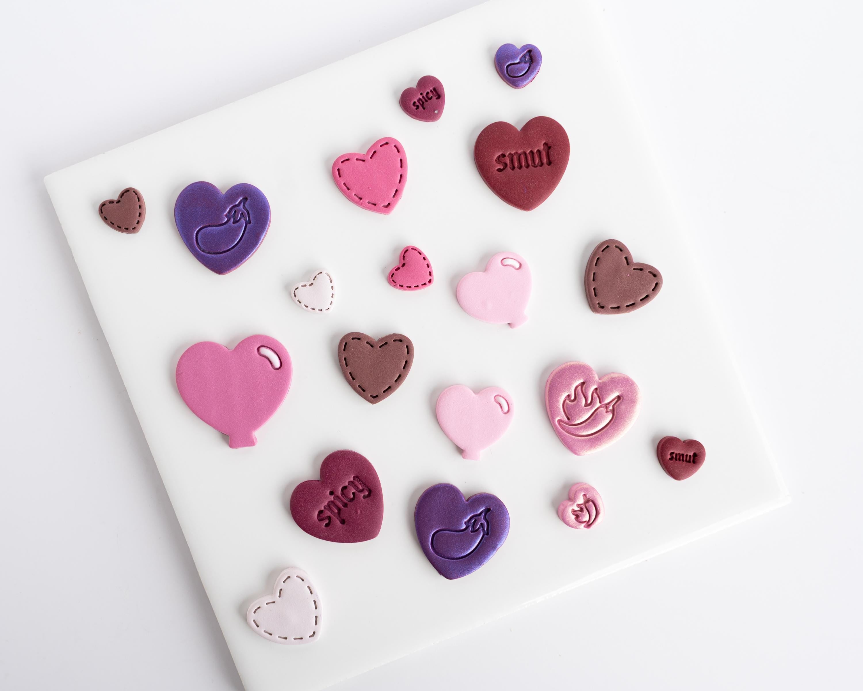 Spicy and Smut Embossed Heart