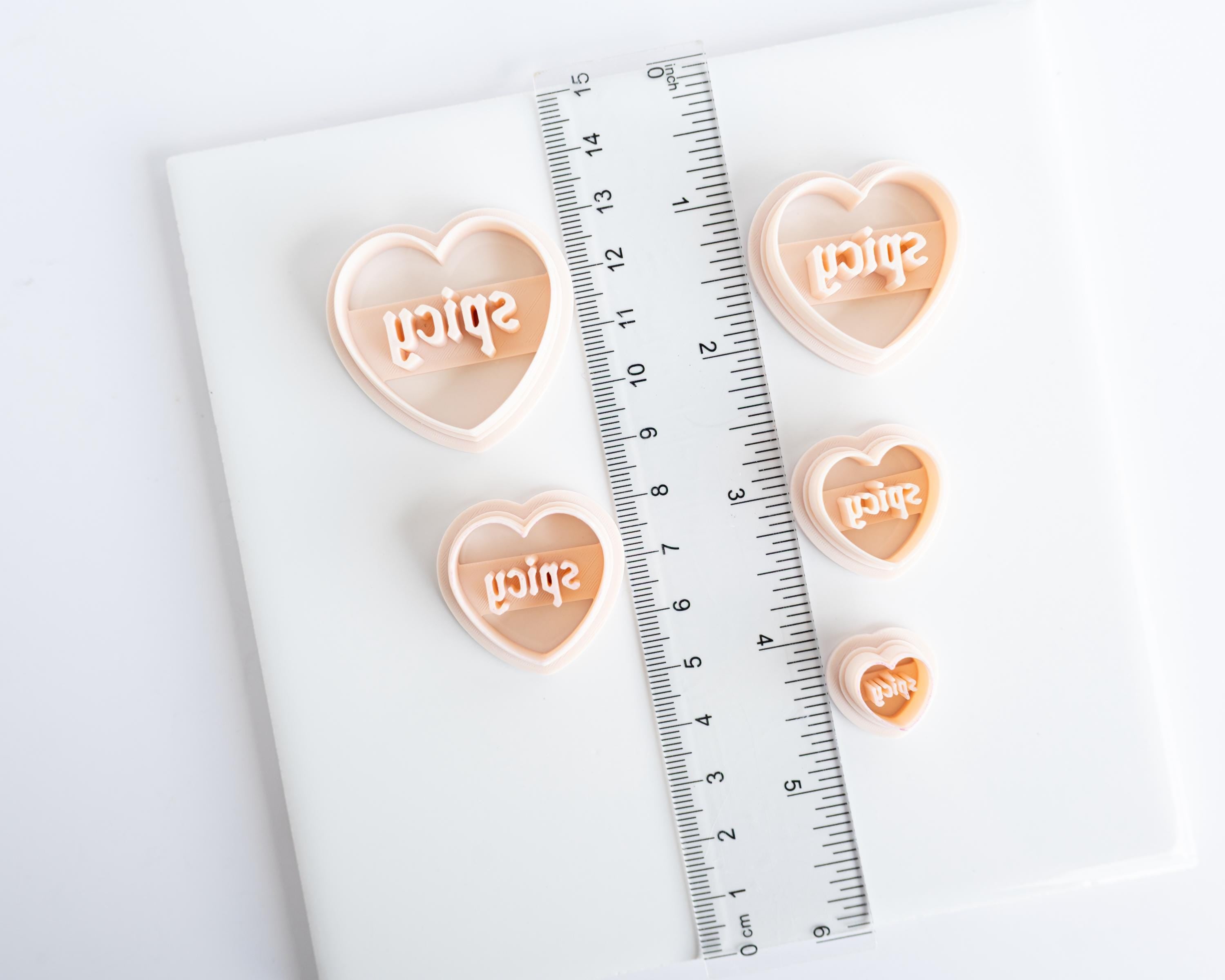 Spicy and Smut Embossed Heart