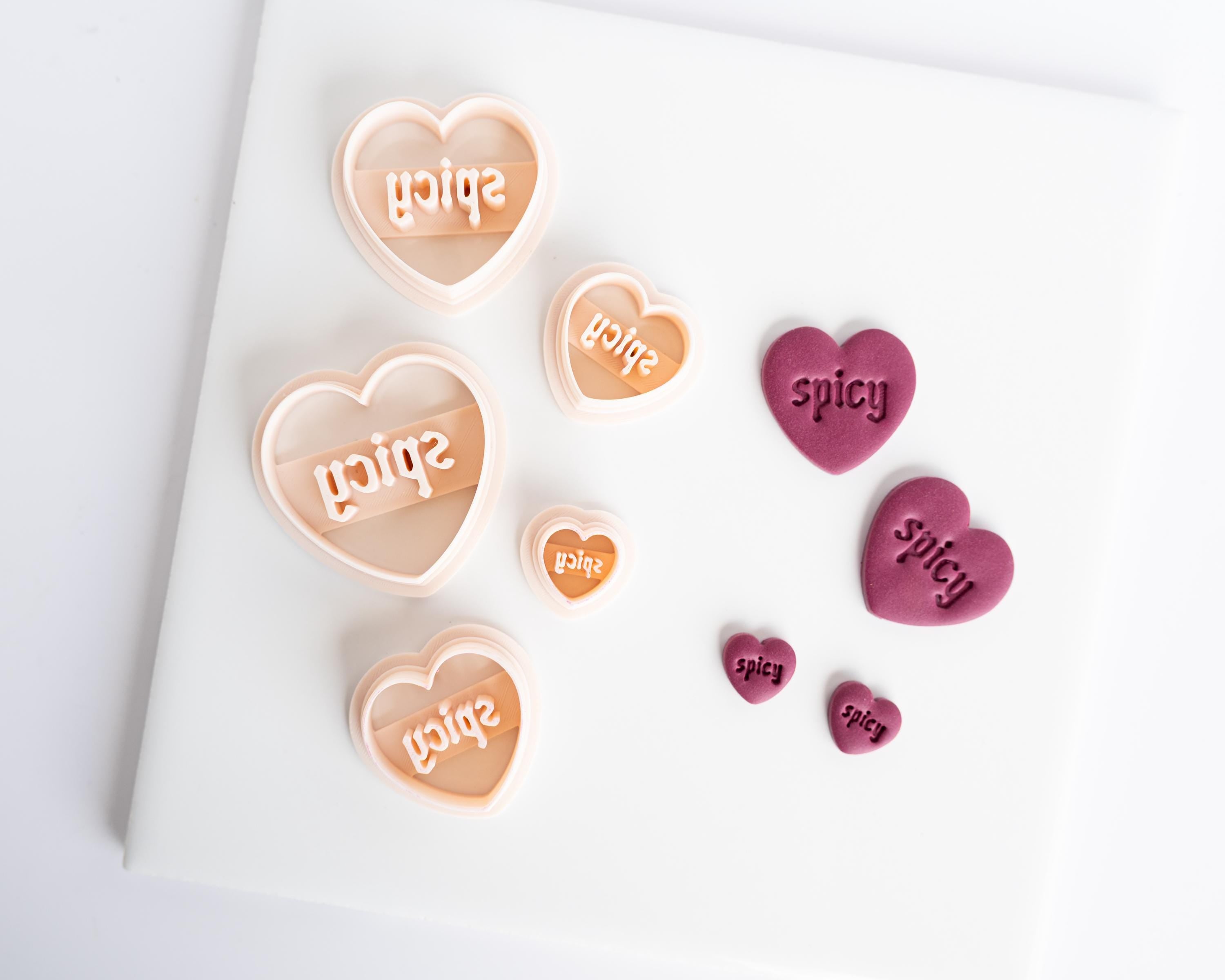 Spicy and Smut Embossed Heart