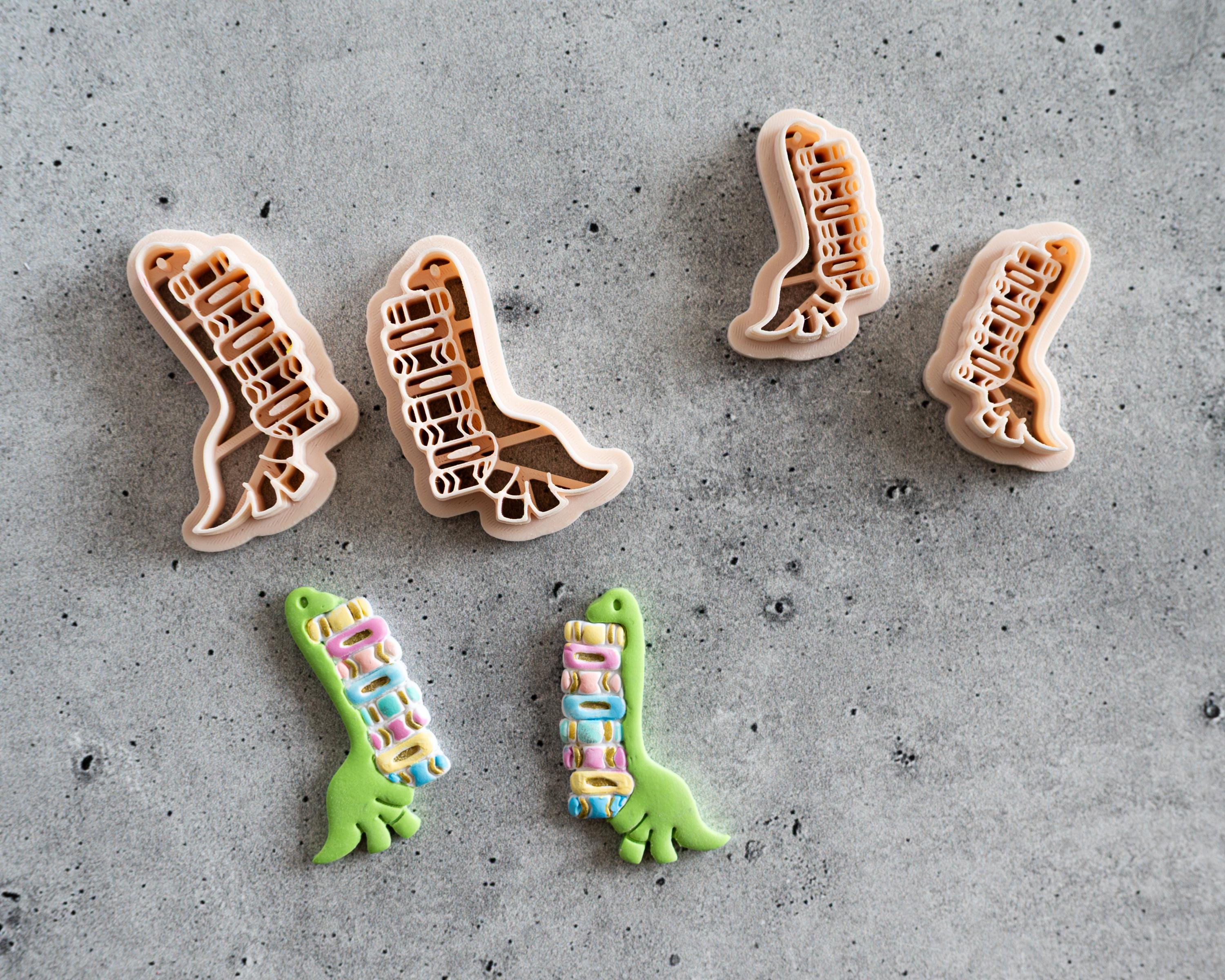 Dinosaur Carrying Books Clay Cutter