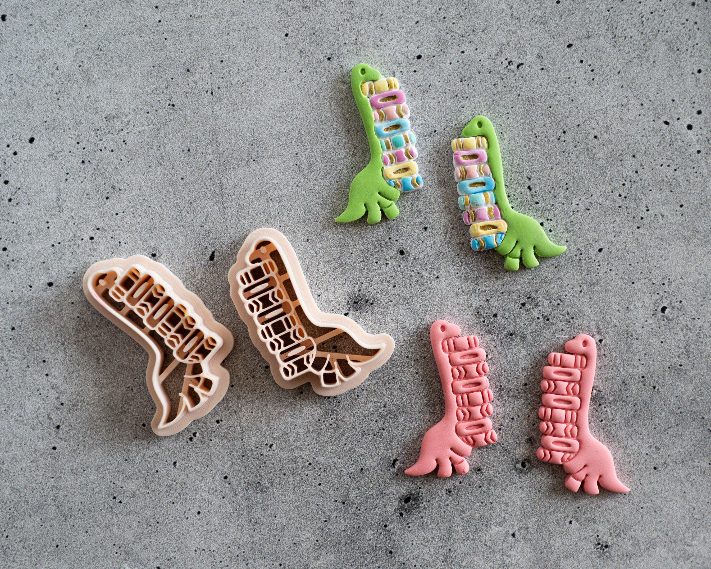 Dinosaur Carrying Books Clay Cutter
