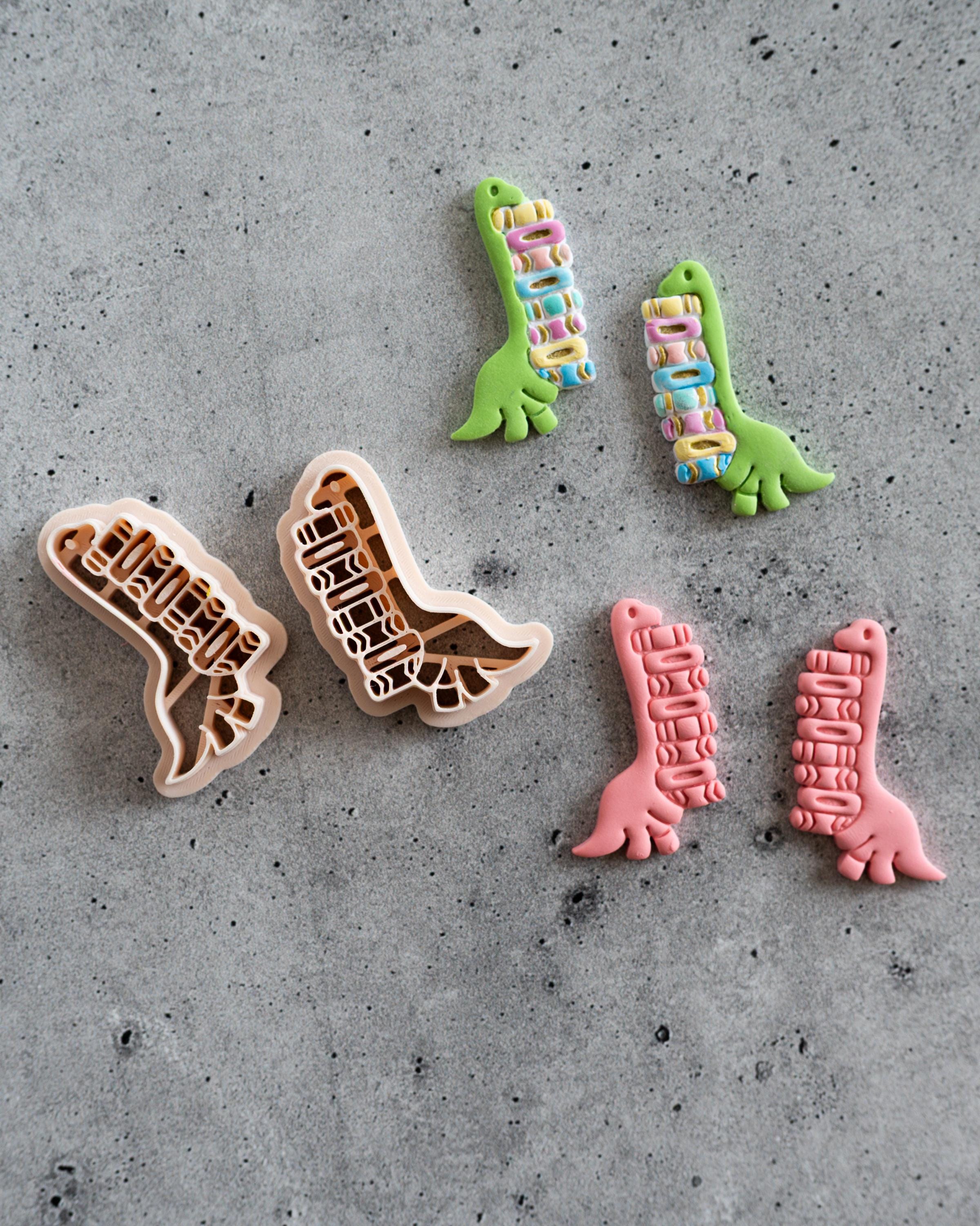Dinosaur Carrying Books Clay Cutter