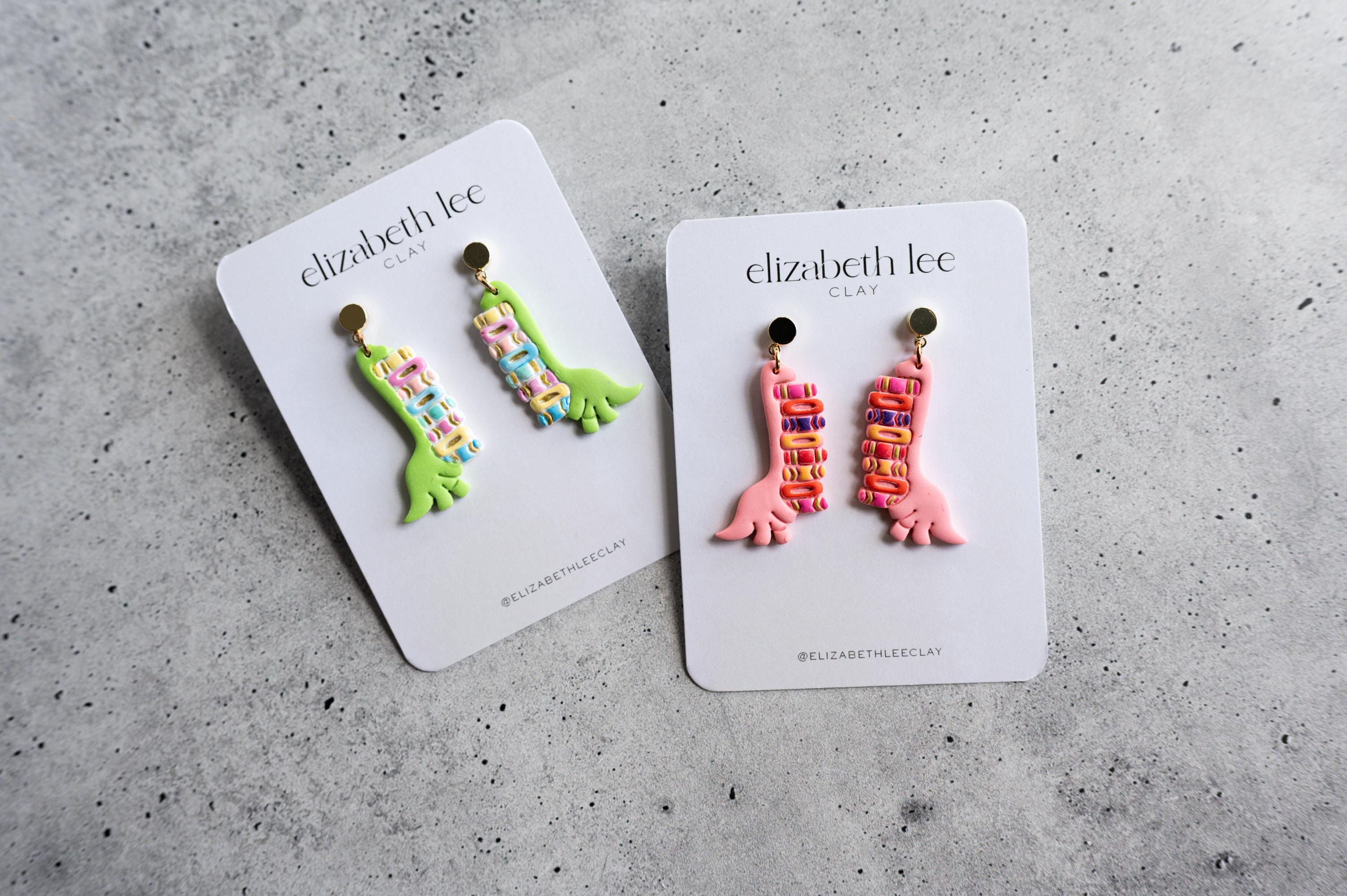 Dinosaur Carrying Books Clay Cutter